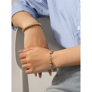 Bracciale bicolore oro e argento in acciaio inossidabile con perline per donna chic