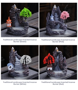Detail of resin backflow incense burners in four colors with landscape and smoke waterfall