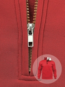 Detailed close-up of red waffle knit texture and sturdy zipper on men's quarter-zip sweatshirt