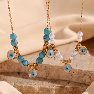 18K gold plated stainless steel necklace with blue turquoise beads and evil eye pendant