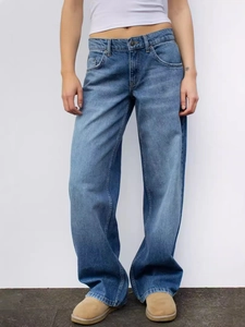 Jean classique en denim bleu délavé vintage à taille haute et coupe large droite