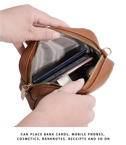 Macro view of brown quilted PU leather bag interior showing large storage capacity