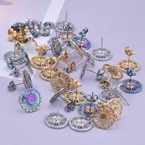 Macro shot of sun-shaped 304 stainless steel stud earrings in silver, gold and rainbow tones