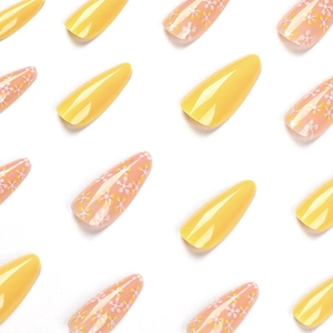 Faux ongles stiletto longs avec motifs floraux jaunes et roses à presser