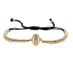 Adjustable gold bead bracelet with Virgin Mary medallion on a black braided cord