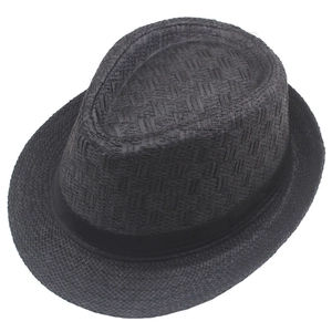 Top-down detail of the fine straw weave and decorative ribbon on a black fedora sun hat