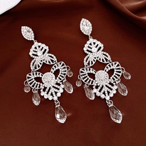 Sparkling crystal flower drop earrings with rhinestones and teardrop pendants in silver