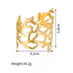 Gold wide cuff bracelet with irregular hollow pattern, diameter 6.2cm and weight 34.2g