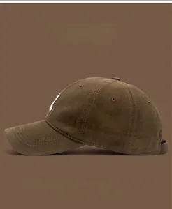 Detail of corduroy baseball cap texture and trendy color palette showing eight color options