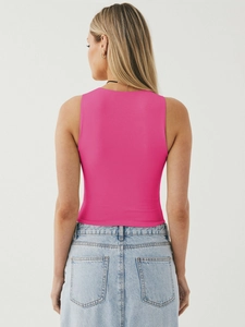 Slim fit rose pink sleeveless tank top back view on a model with soft lighting