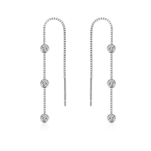 Detail view of S925 sterling silver threader earrings with three round cubic zirconia stones