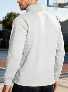 Back view of men's white waffle knit sweatshirt in an outdoor basketball court setting