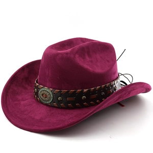 Detail of fuchsia suede cowboy hat with studded leather band and vintage buckle