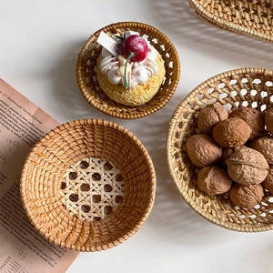 Handcrafted round rattan woven storage baskets in natural brown for home organization