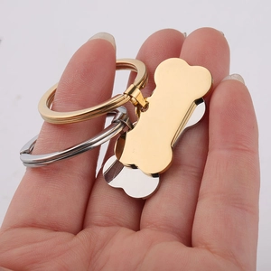 Polished bone-shaped stainless steel pet ID tags in gold and silver with keyrings