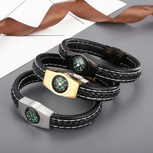Braided leather compass bracelets in gold, silver, and black metal finishes for men
