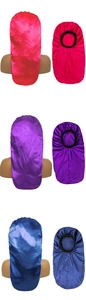 Close-up of silky satin sleep bonnets for long hair in red, purple, and blue colors