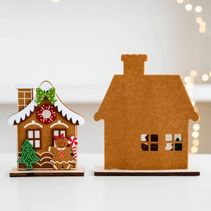 Christmas felt gingerbread house desktop decorations with wooden base and festive motifs
