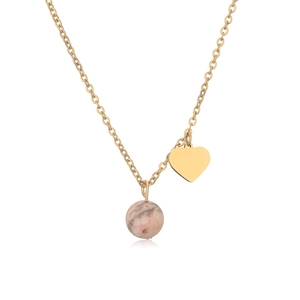Detail of gold chain necklace with pink marble bead and polished heart pendant charms