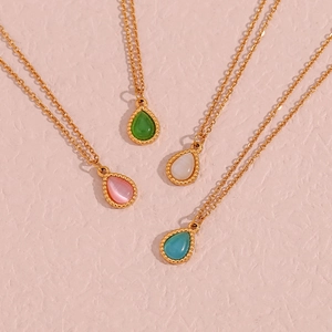 Set of minimalist golden teardrop necklaces with colorful cat eye stone pendants