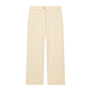 Détail du pantalon large crème à taille haute avec un bouton métallique doré unique