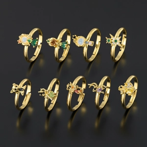 Set of nine gold adjustable rings with micro-paved colorful zircon animal and star designs