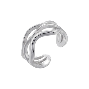 Macro detail of silver fluid line ear cuffs with a polished multi-layer wave design