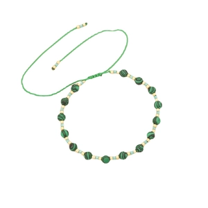 Bohemian adjustable green stone beaded bracelet with gold metal accents and woven rope