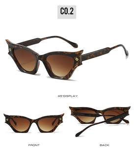 Detailed views of vintage tortoiseshell cat eye sunglasses with gold accents and gradient lenses