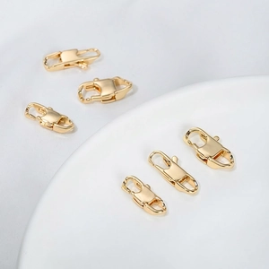 Polished 14K gold-plated stainless steel lobster clasps in two sizes for jewelry making