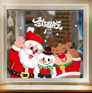 Détail de stickers électrostatiques de Père Noël et bonhomme de neige sur une vitre claire