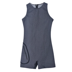 Close-up of sleeveless grey denim bodysuit with front zipper and side zip pocket detail