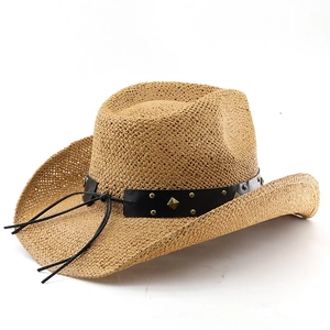 Detail of straw cowboy hat featuring black faux leather band and bronze metal studs