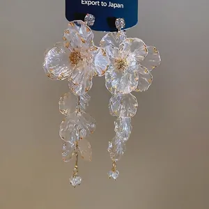 Elegant floral tassel earrings with acrylic petals and sparkling crystal droplets