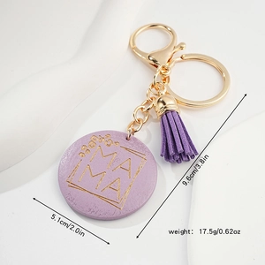 Macro shot of purple wooden Mama keychain with tassel showing dimensions and weight