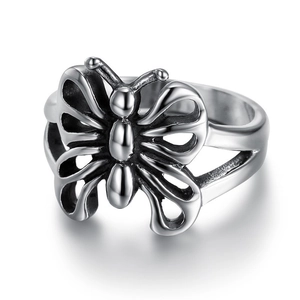 Gothic vintage hollow butterfly joint ring in polished silver finish on white background