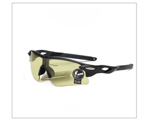 Detail view of bright black sports goggles featuring yellow night vision lenses at 45 degrees