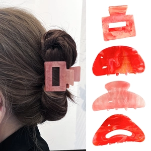 Acrylic marble texture hair claw clips set in various geometric shapes for women