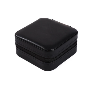 Portable black PU leather jewelry box with zipper for rings and necklaces in 45-degree view