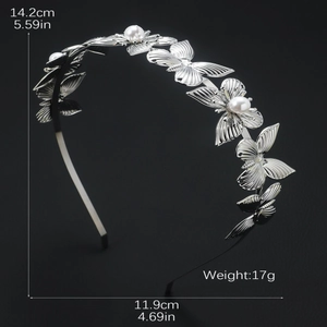 Baroque silver metal headband with hollow butterflies and pearls on a black background