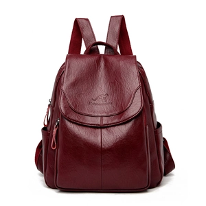Deep red leather backpack for women with large capacity and embossed kangaroo logo detail
