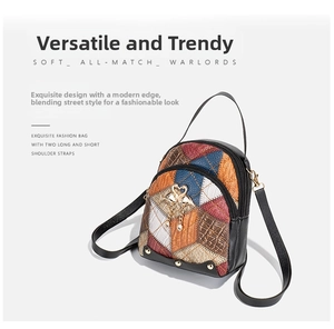 Detail of colorful patchwork backpack with golden swan metal decor and croco texture