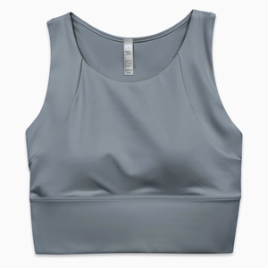 Dettaglio del reggiseno sportivo blu grigio con tessuto in nylon e spalline larghe