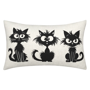 Detail of linen pillowcase with black cartoon cat silhouettes on beige fabric texture