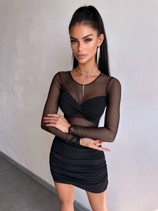 Detail of sexy black mesh long sleeve dress with ruched bodycon design and twist neckline