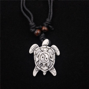 Resin sea turtle pendant necklace with tai chi yin yang pattern on black cord