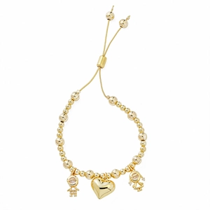 Detailed view of gold beaded bracelet with adjustable slider and micro-pave charms
