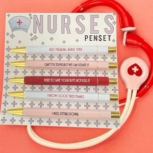 Close-up of a 5-pack nurse theme penset with humor quotes and toy stethoscope decoration