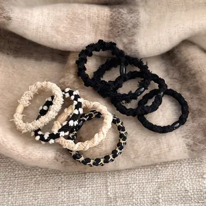 8-piece set of elegant beige and black plush elastic hair ties with decorative beads