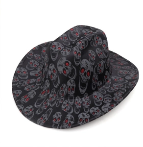 Detail of black cowboy hat featuring gray skull prints and sparkling red sequin eyes